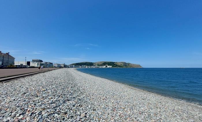 Beach and promenade in front of the Llandudno Bay Hotel.